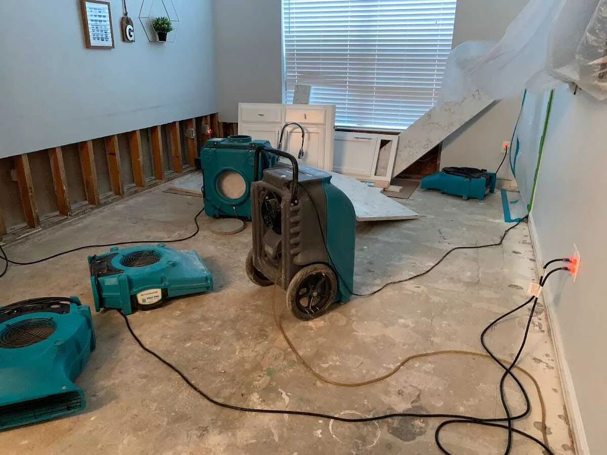 Dehumidifier in flood-cut room for Water Damage Restoration in Heath